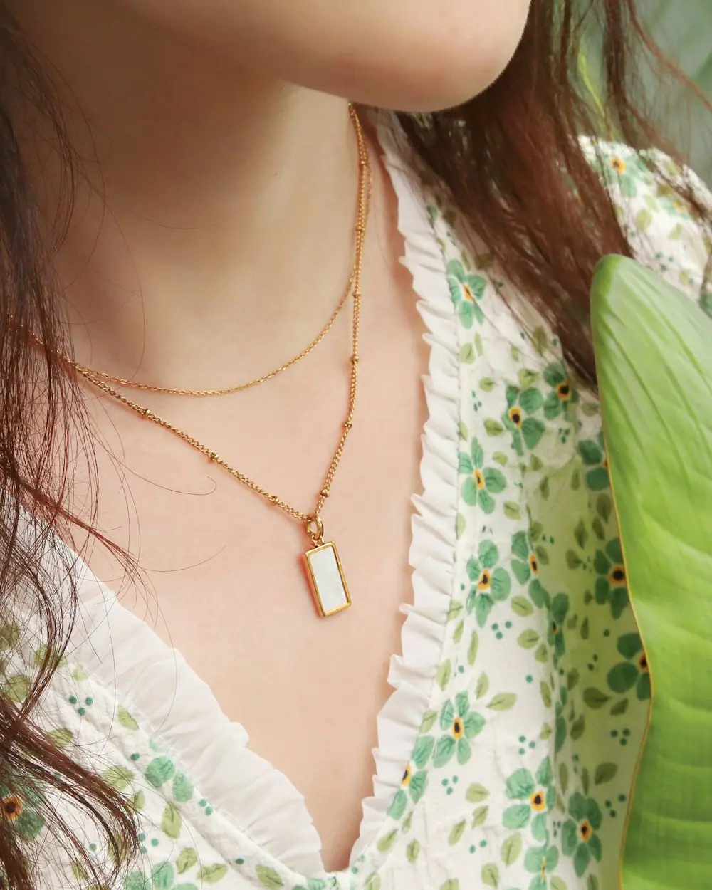 Cuello con collar de medalla